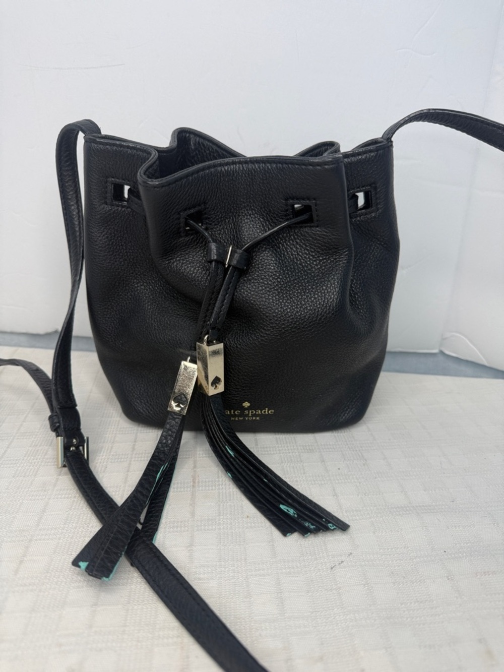 Kate Spade New York drawstring bucket bag, from the Grey Street Tiny Cooper"